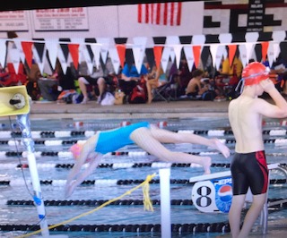 In this photo Im jumping off the block during the race.