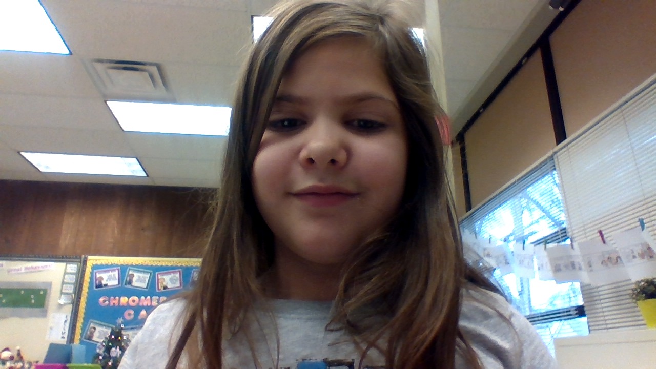 Savannah in a class taking a picture!