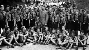 This picture is some young boys with Hitler