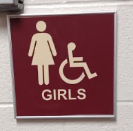 This is the sign to the girls restroom in the seventh grade hallway.