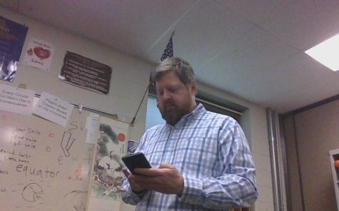 Mr. Hawley on his cellular device
