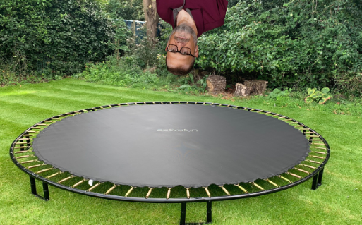 Tuttle about to get hurt on a trampoline.